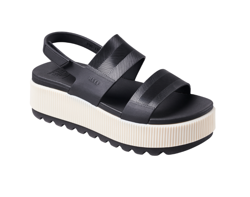 Black platform sandal with white sole on a white background