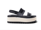 Black platform sandal with white sole on a white background