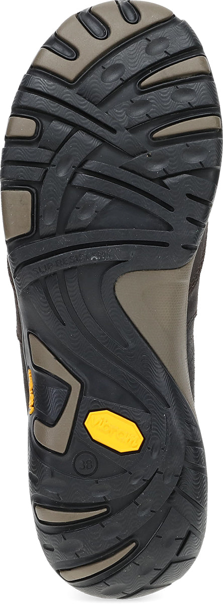 Close-up of the outsole of a hiking boot, showing a black and gray tread pattern with a small yellow Vibram logo.