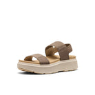 Beige sandal with a platform sole on a white background