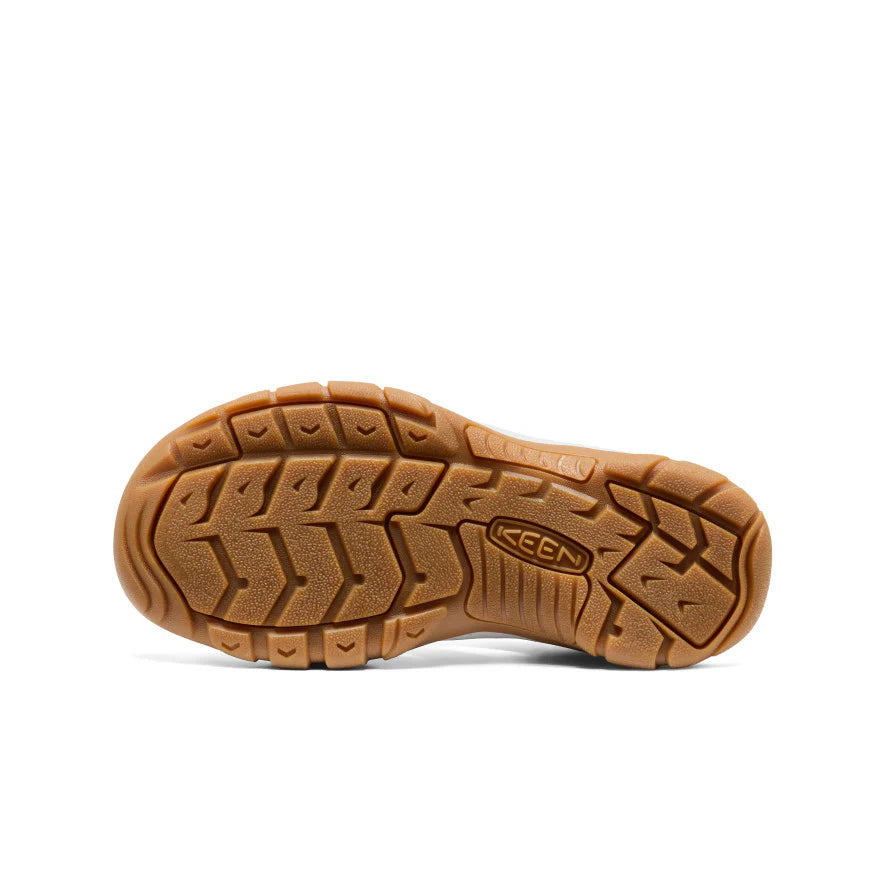 Brown sole of a shoe with 'Keen' branding on a white background