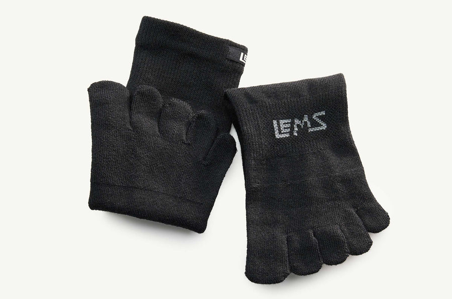 Pair of black toe socks with 'LEMS' branding on a white background