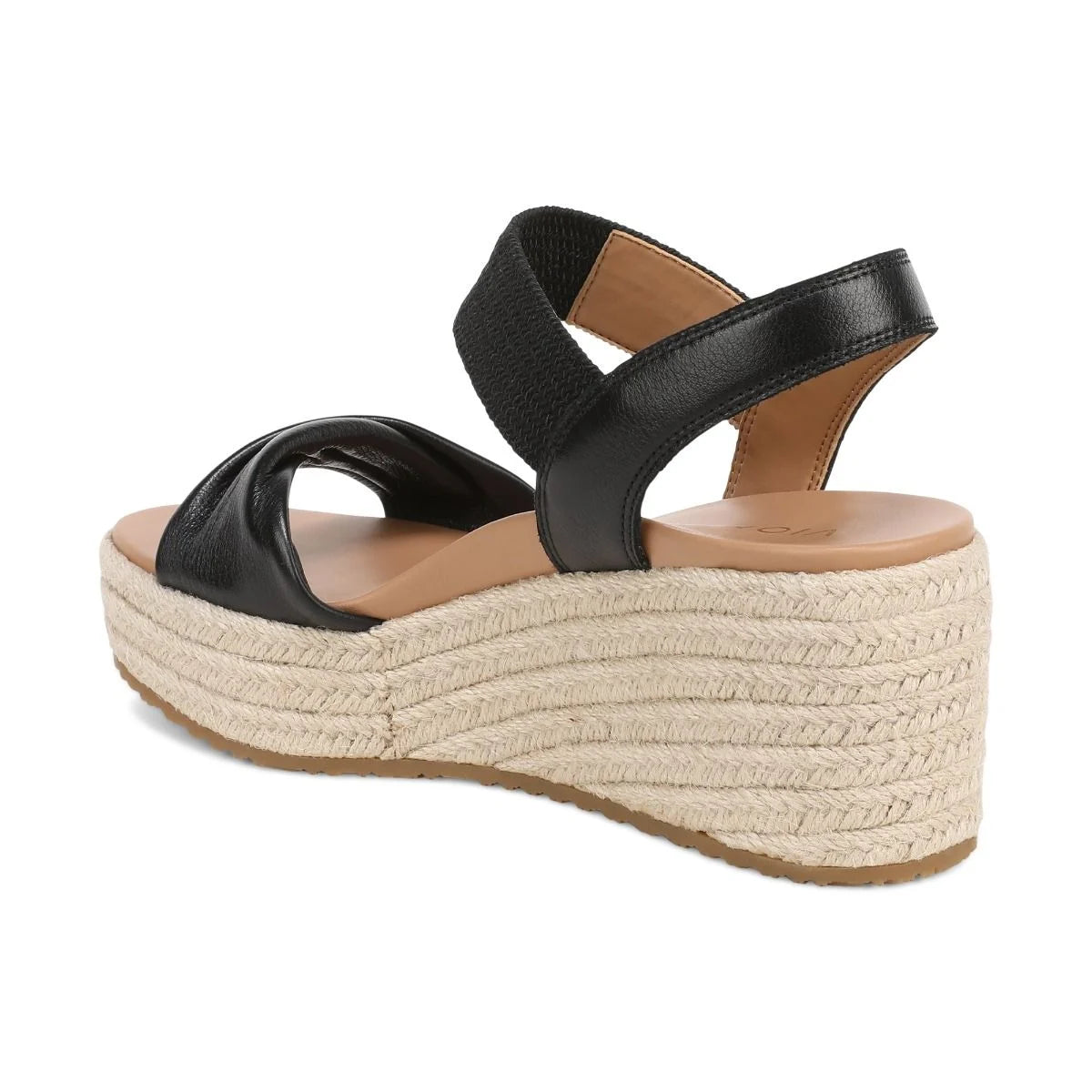 Black wedge sandal with espadrille sole on a white background