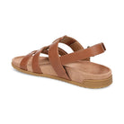 Brown sandal with multiple straps on a white background