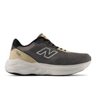 Gray running shoe with beige accents on a white background