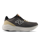 Gray and beige running shoe with New Balance logo on a white background