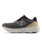 Gray and beige running shoe with New Balance logo on a white background
