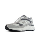 Gray and white sneaker on a white background