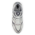 Gray and white sneaker with New Balance logo on a white background