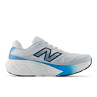 White and blue running shoe with New Balance logo on a white background