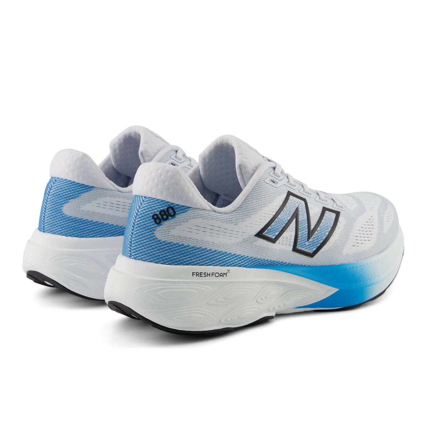 White and blue running shoes with New Balance logo on a white background