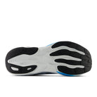 Side view of a shoe sole with black, white, and blue design on a white background