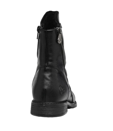 A black leather ankle boot shown from the back, featuring a side zipper with a silver metal pull tab and a low stacked sole.