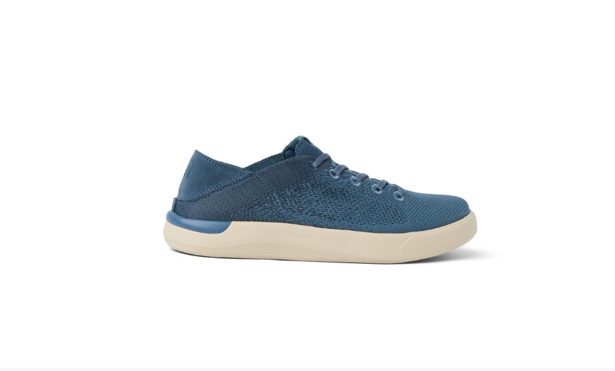 Blue sneaker with white sole on a white background