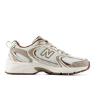 Black new balance running shoe with white sole on a white background