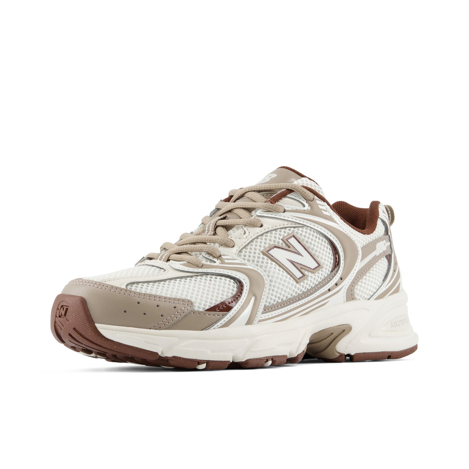 A New Balance athletic sneaker in beige, white, and brown, shown from a side profile view against a plain white background.