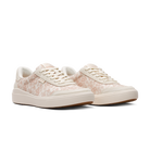 Pair of white sneakers with a subtle pattern on a white background