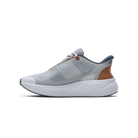 Gray athletic shoe with brown accents on a white background