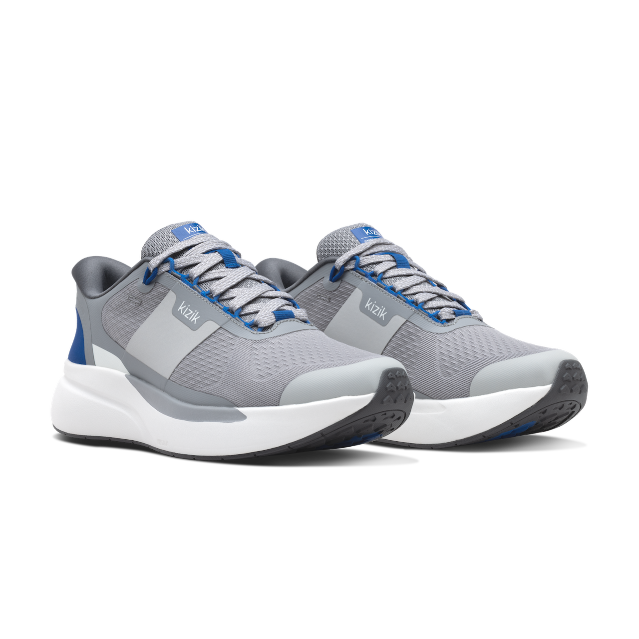 Gray and blue athletic shoes on a white background