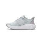 Gray athletic shoe on a black background