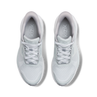 Pair of white sneakers with 'kizik' branding on a white background