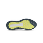 Close-up of a shoe sole with a textured pattern on a black background