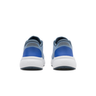 Pair of blue and white shoes on a black background