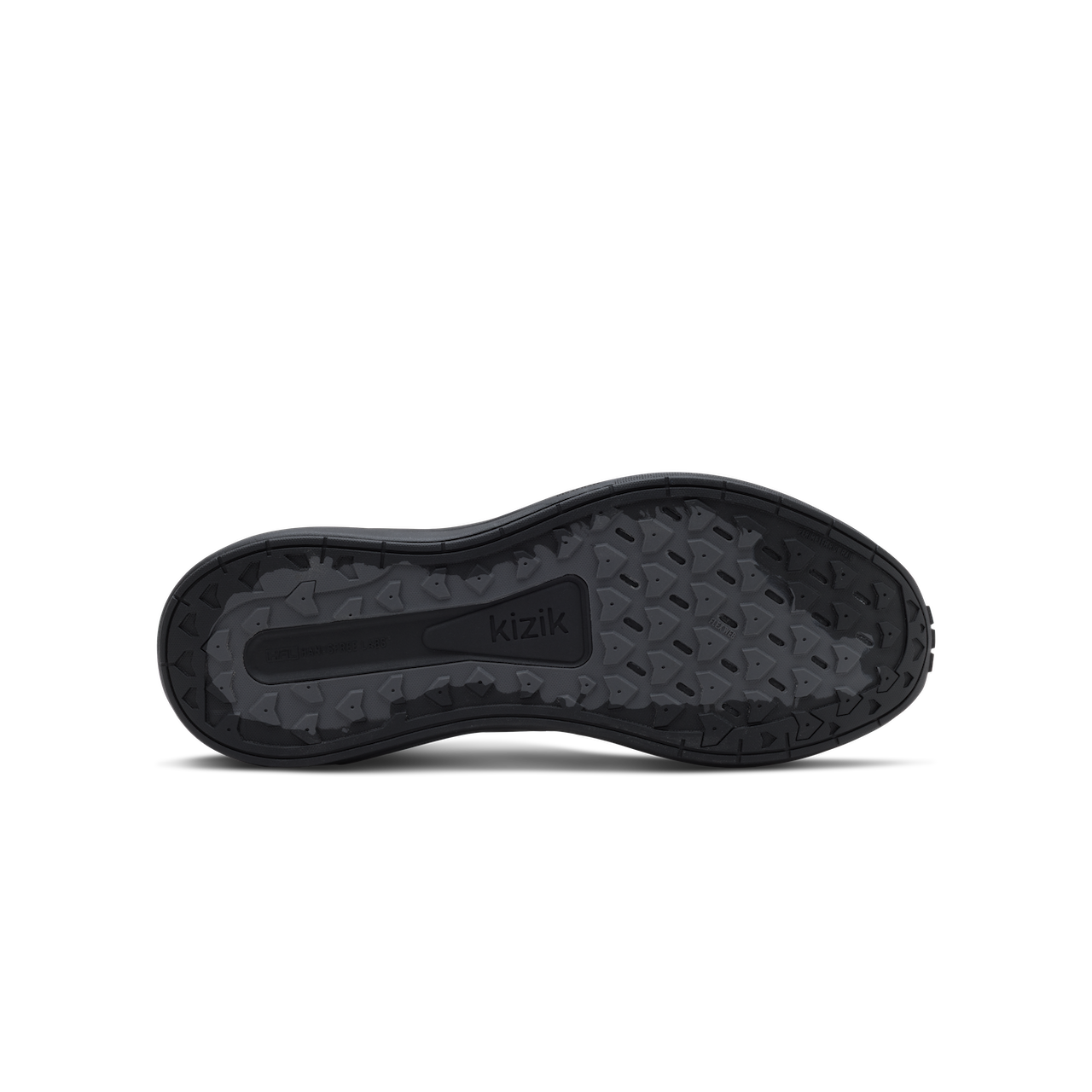 The black rubber outsole of a shoe, showing the 'kizik' brand name embossed in the center, photographed from a top-down view on a white background.