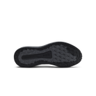 The black rubber outsole of a shoe, showing the 'kizik' brand name embossed in the center, photographed from a top-down view on a white background.