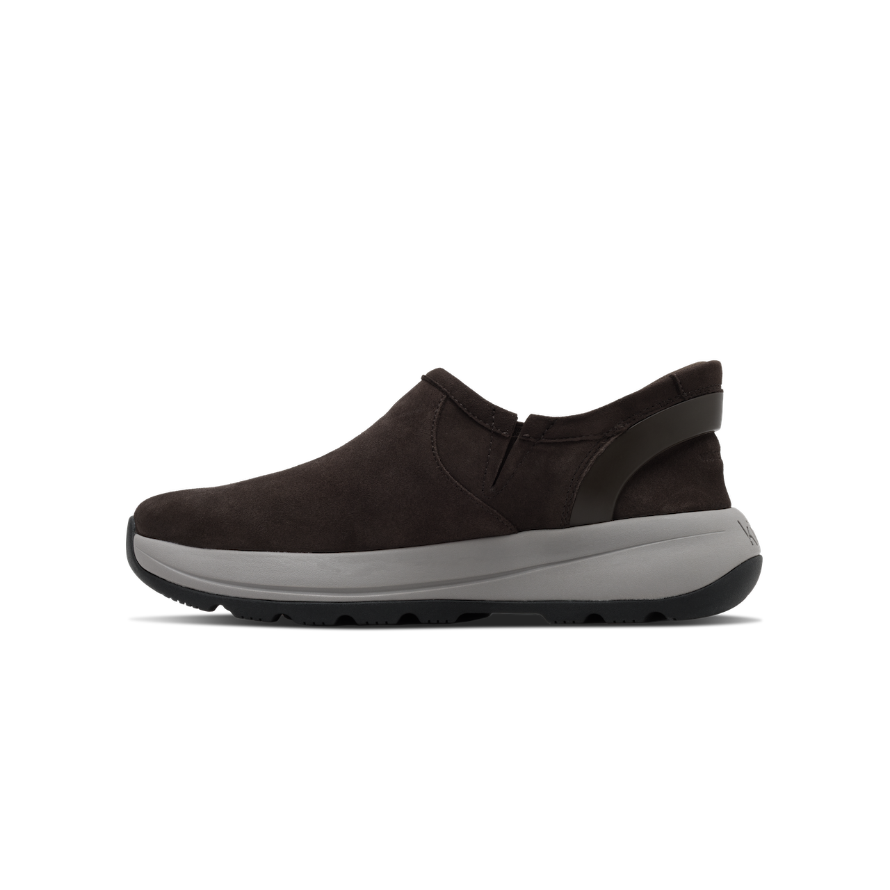 Brown slip-on shoe with white sole on a black background