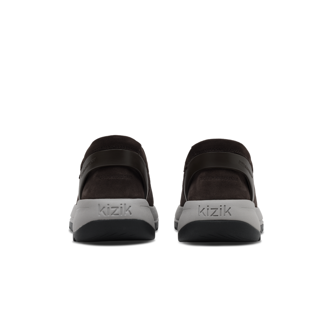 A pair of Kizik brand slip-on shoes shown from the back, featuring dark brown upper straps and a light gray sole with the brand name 'kizik' printed on it.