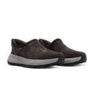 Pair of brown slip-on shoes with gray soles on a white background