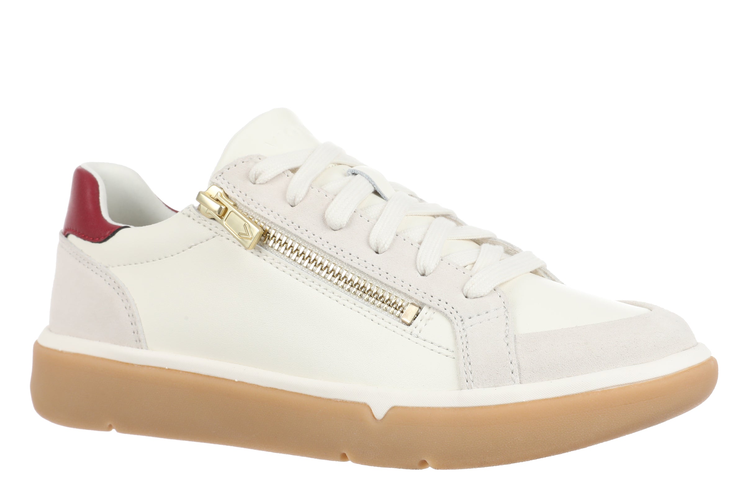 A white leather low-top sneaker with a gold-tone side zipper, white laces, a red heel tab, and a thick tan gum sole, shown against a plain white background.