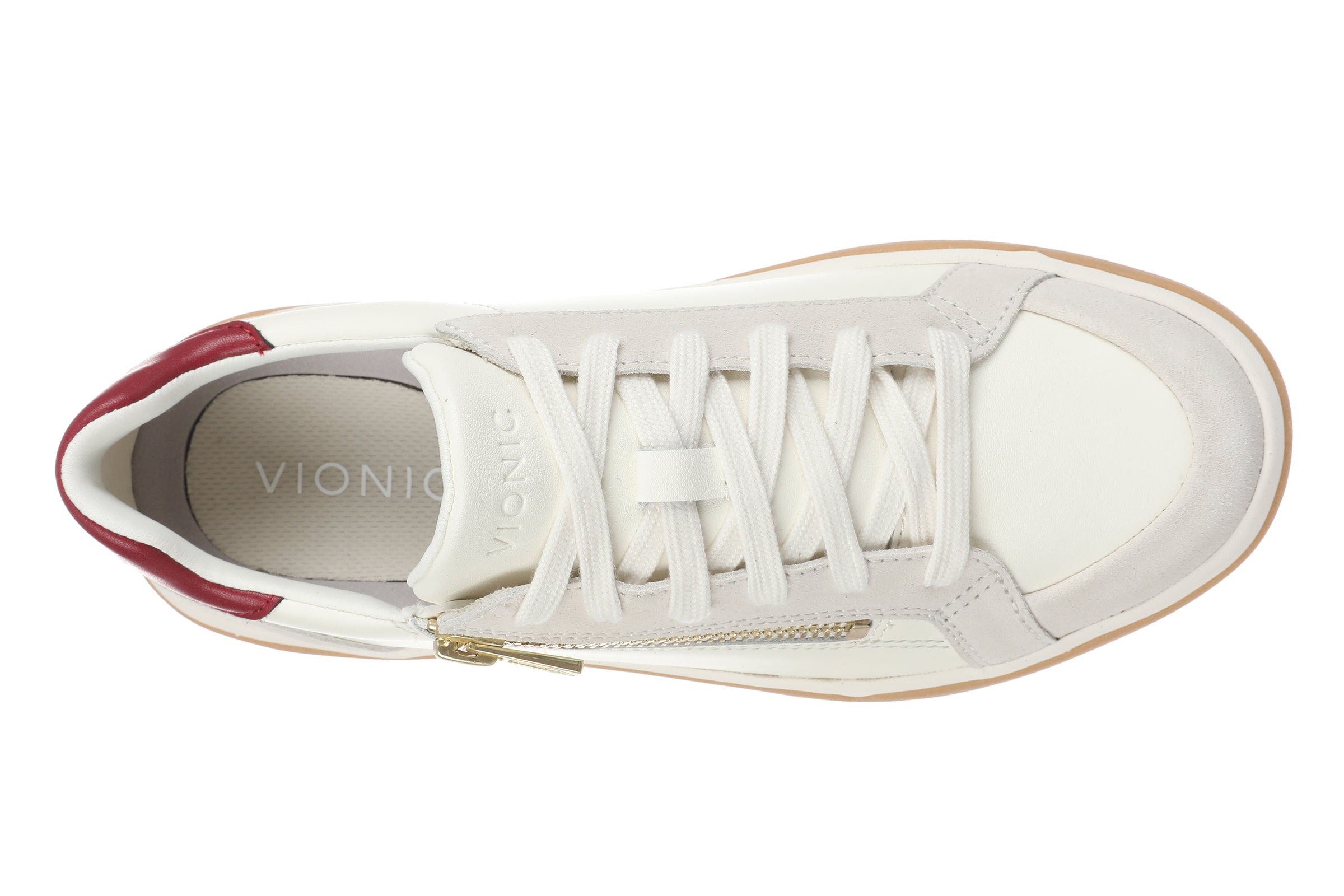 A top-down view of a Vionic white leather sneaker with a side zipper, white laces, a red heel tab, and a light tan outsole on a white background.