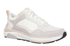 A low-top athletic sneaker in white, light gray, and beige, featuring a mesh and suede upper, white laces, and a thick white midsole with a black outsole.