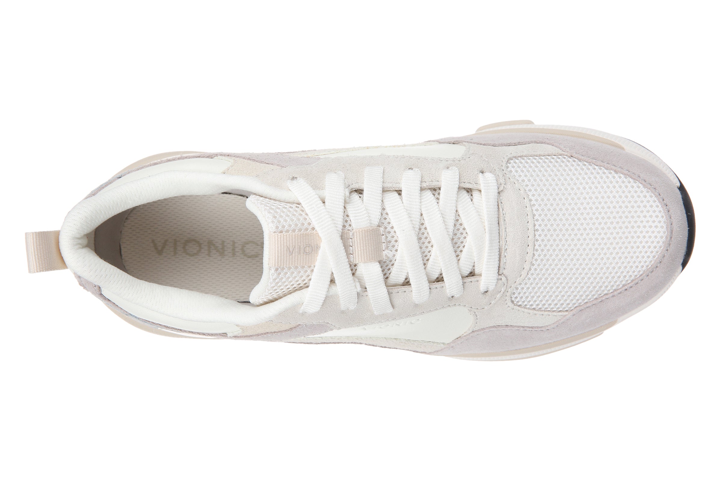 A top-down view of a white Vionic sneaker with white laces, white mesh panels, and a light gray suede overlay on the side, set against a plain white background.