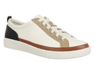 A low-top sneaker with an off-white leather upper, beige side panels, a brown leather stripe, a black heel accent, and a thick off-white sole.