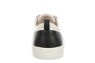 A single low-top sneaker shown from the rear, featuring an off-white leather upper with a contrasting black leather heel panel and a thick off-white rubber sole.