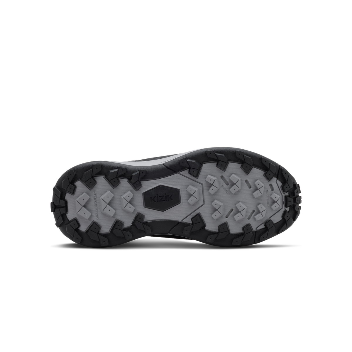 Close-up of a shoe sole with tread pattern on a black background