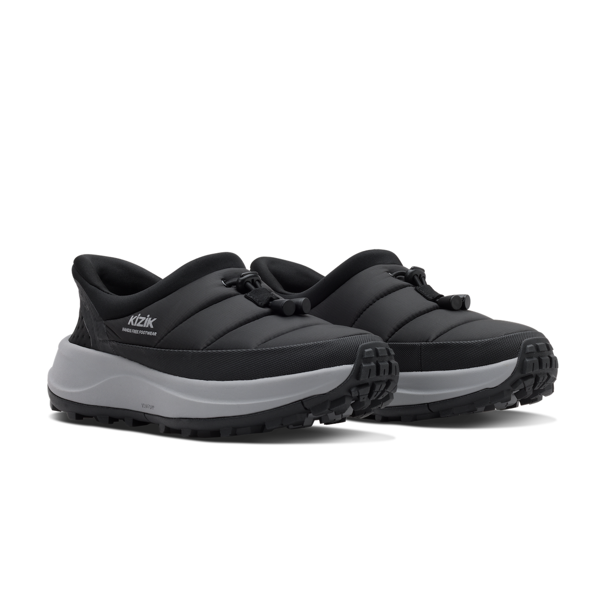 Black slip-on shoes with white soles on a transparent background