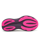 Pink and black shoe sole on a white background