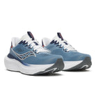 A pair of Saucony athletic sneakers in blue and white, featuring a breathable mesh upper, white laces, a thick white midsole, and a dark gray outsole, shown against a plain white background.
