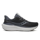 Black and gray running shoe with white sole on a white background