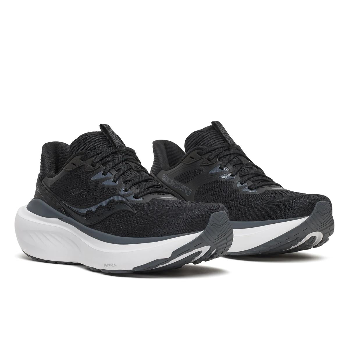 A pair of black running shoes with a thick white and dark gray sole, shown from a three-quarters angle on a white background.