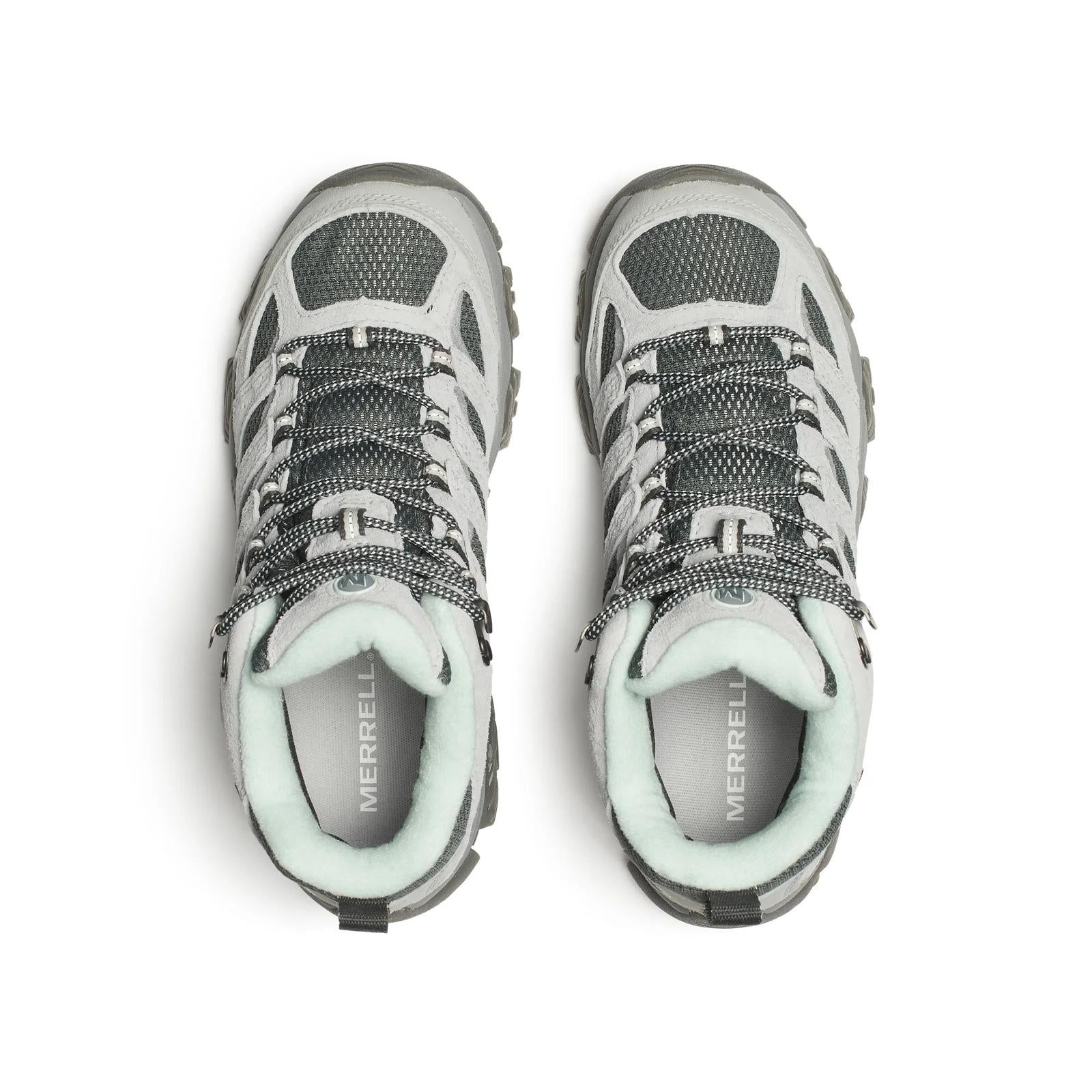 Pair of Merrell hiking shoes on a white background
