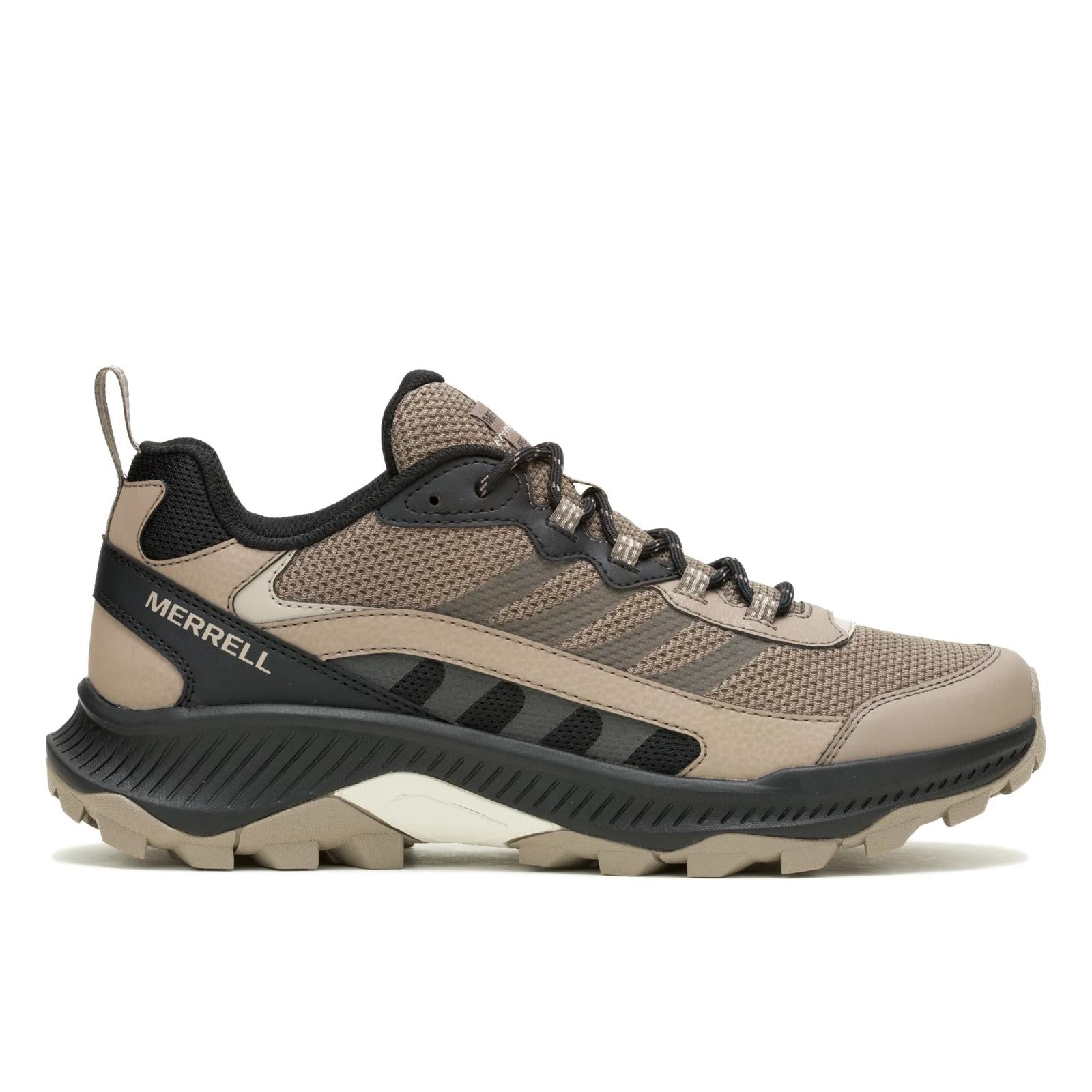 Brown hiking shoe with black sole on a white background