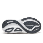 The outsole of a Calbee athletic shoe, featuring a white midsole with dark gray and black tread patterns, shown on a white background.