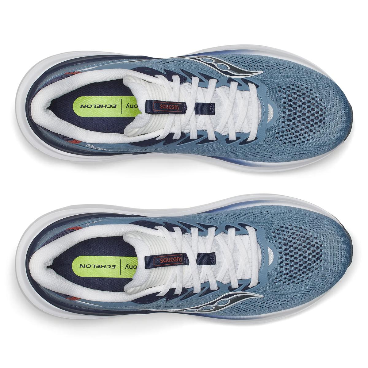 A pair of Saucony running shoes in blue and white, shown from a top-down view on a white background.