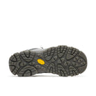 Close-up of a gray hiking boot sole with a yellow label on a white background