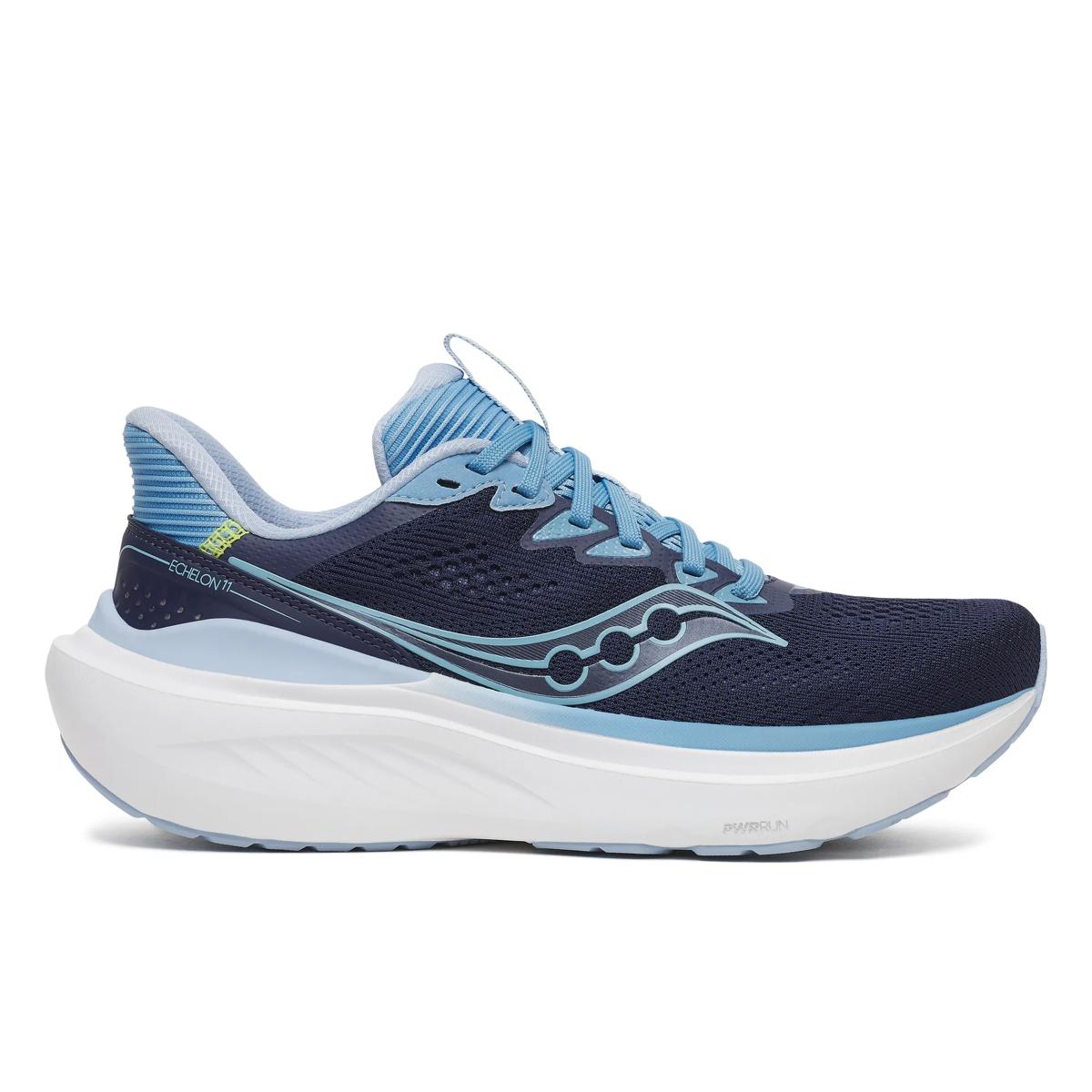 A Saucony running shoe in navy blue and light blue with a thick white midsole, shown from a side profile view on a white background.